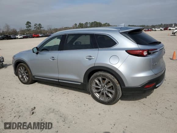 ✅ 2020 Mazda CX-9 Grand Touring • VIN: JM3TCADY0L0417673 • Лот: 44625195. Опубликован ранее на Copart с пробегом 94 221 миль. Бесплатный доступ к архиву аукционных продаж из США и подробный отчёт об истории автомобиля на DreamBid. Изображение 2.