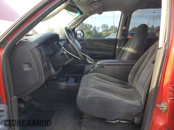 2003 Dodge Dakota SLT с VIN 1D7HG48NX3S345590, выставлен на аукционе Copart как лот 70002875 с пробегом 437 659 миль миль и Чистый • Clean title. История ставок и продаж доступна на DreamBid. Изображение 7.