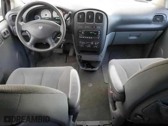 2006 Dodge Grand Caravan SE with VIN 1D4GP24R66B697589, listed as a Copart auction lot 90105685 with 303,817 mi miles and Salvage title. Bid and sale history available at DreamBid. Image 8.