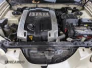 ✅ 2005 Kia Amanti • VIN: KNALD124455054156 • Lot: 84115544. Listed on Copart with 164,476 mi. Free auction sales archive from the USA and detailed vehicle history report at DreamBid. Image 11.