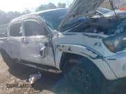 ✅ 2010 Toyota Tacoma PreRunner • VIN: 3TMJU4GNXAM103720 • Lot: 42994037. Listed on IAAI with 214,592 mi. Free auction sales archive from the USA and detailed vehicle history report at DreamBid. Image 11.