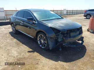 ✅ 2013 Cadillac XTS • VIN: 2G61N5S36D9175393 • Lot: 42017733. Wystawiony na IAAI z przebiegiem 133 759 mil. Bezpłatny archiwum sprzedaży aukcyjnych z USA i szczegółowy raport historii pojazdu na DreamBid. Zdjęcie 1.