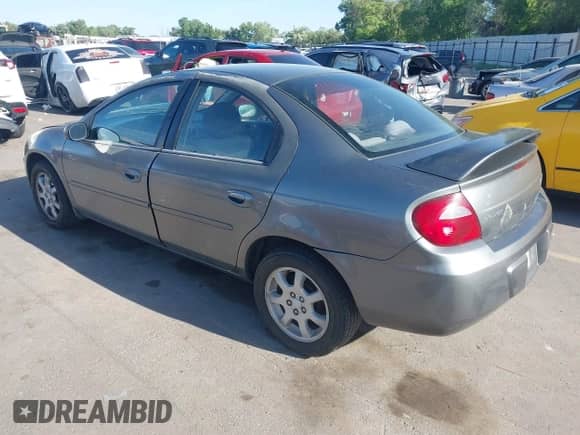 2005 Dodge Neon SXT z VIN 1B3ES56C95D221418, wystawiony jako IAAI lot #42353948 z przebiegiem 128 537 mil mil oraz . Historia ofert i sprzedaży dostępna na DreamBid. Obrazek 3.
