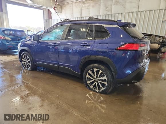 ✅ 2023 Toyota Corolla Cross XLE • VIN: 7MUDAABG7PV054407 • Lot: 90499265. Listed on Copart with 31,853 mi. Free auction sales archive from the USA and detailed vehicle history report at DreamBid. Image 2.