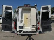 ✅ 2022 Mercedes-Benz Sprinter Cargo • VIN: W1X4EBHY0NP484324 • Лот: 70476525. Опубликован ранее на Copart с пробегом 8 679 миль. Бесплатный доступ к архиву аукционных продаж из США и подробный отчёт об истории автомобиля на DreamBid. Изображение 6.