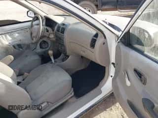 2001 Hyundai Accent GS with VIN KMHCG35C81U090873, listed as a IAAI auction lot 41436739 with 59,359 mi miles and . Bid and sale history available at DreamBid. Image 5.