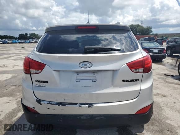 2013 Hyundai Tucson GLS z VIN KM8JU3AC4DU574811, wystawiony jako Copart lot #69299034 z przebiegiem 149 591 mil mil oraz Szkoda całkowita • Salvage title. Historia ofert i sprzedaży dostępna na DreamBid. Obrazek 6.
