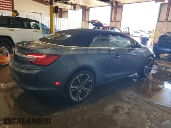 ✅ 2016 Buick Cascada Premium • VIN: W04WT3N52GG071798 • Lot: 90039075. Listed on Copart with 33,159 mi. Free auction sales archive from the USA and detailed vehicle history report at DreamBid. Image 3.