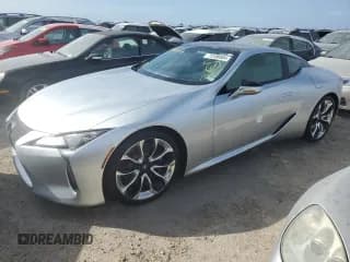 ✅ 2018 Lexus LC 500h • VIN: JTHHP5AY3JA005056 • Лот: 75100584. Опубликован ранее на Copart с пробегом Не указан. Бесплатный доступ к архиву аукционных продаж из США и подробный отчёт об истории автомобиля на DreamBid. Изображение 1.