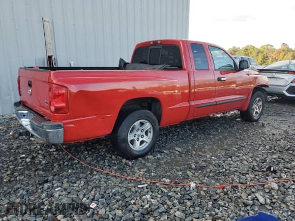 2006 Dodge Dakota SLT with VIN 1D7HE42N76S501233, listed as a Copart auction lot 80200934 with 281,599 mi miles and Salvage title. Bid and sale history available at DreamBid. Image 3.