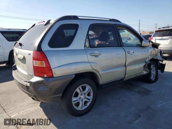 ✅ 2006 Kia Sportage LX • VIN: KNDJF723967155388 • Lot: 90304395. Listed on Copart with 129,374 mi. Free auction sales archive from the USA and detailed vehicle history report at DreamBid. Image 3.