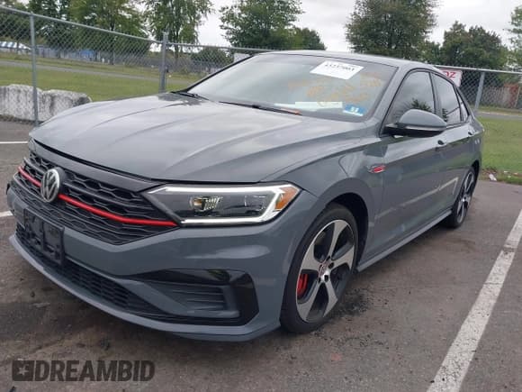 ✅ 2020 Volkswagen Jetta S • VIN: 3VW5T7BU9LM046348 • Лот: 43237003. Опубликован ранее на IAAI с пробегом 57 356 миль. Бесплатный доступ к архиву аукционных продаж из США и подробный отчёт об истории автомобиля на DreamBid. Изображение 2.