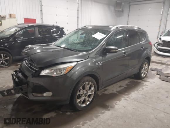 ✅ 2015 Ford Escape Titanium • VIN: 1FMCU9JX5FUA35888 • Lot: 41209408. Listed on IAAI with 125,378 mi. Free auction sales archive from the USA and detailed vehicle history report at DreamBid. Image 2.