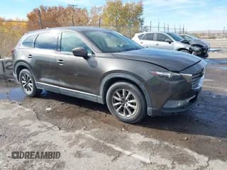 ✅ 2016 Mazda CX-9 Touring • VIN: JM3TCBCY3G0112522 • Lot: 43806962. Wystawiony na IAAI z przebiegiem 102 518 mil. Bezpłatny archiwum sprzedaży aukcyjnych z USA i szczegółowy raport historii pojazdu na DreamBid. Zdjęcie 1.