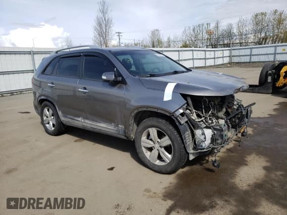 ✅ 2013 Kia Sorento EX • VIN: 5XYKUDA21DG411766 • Lot: 55960765. Listed on Copart with 159,584 mi. Free auction sales archive from the USA and detailed vehicle history report at DreamBid. Image 4.