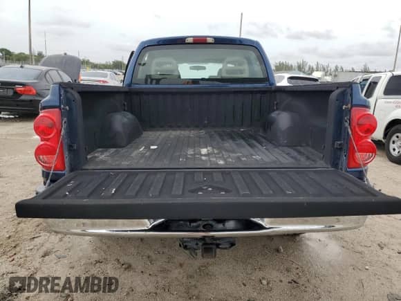 2005 Dodge Dakota SLT с VIN 1D7HE48N55S187166, выставлен на аукционе Copart как лот 59191165 с пробегом Не указан миль и Списание • Salvage title. История ставок и продаж доступна на DreamBid. Изображение 6.