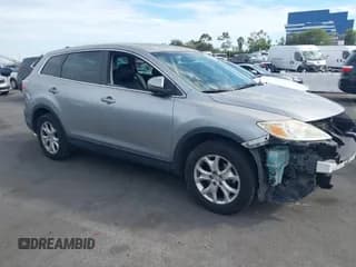 ✅ 2011 Mazda CX-9 Touring • VIN: JM3TB2CV9B0323905 • Lot: 43253604. Listed on IAAI with 121,308 mi. Free auction sales archive from the USA and detailed vehicle history report at DreamBid. Image 1.