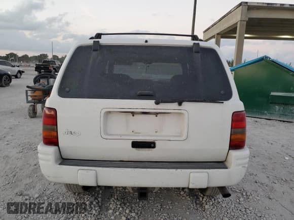 ✅ 1998 Jeep Grand Cherokee Laredo • VIN: 1J4GZ48S8WC313204 • Lot: 93124765. Listed on Copart with Not provided. Free auction sales archive from the USA and detailed vehicle history report at DreamBid. Image 6.