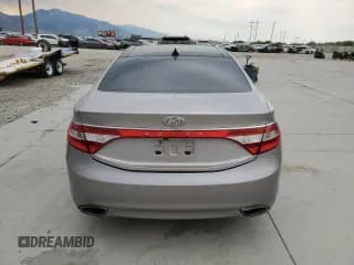 ✅ 2013 Hyundai Azera • VIN: KMHFH4JG1DA307985 • Лот: 66847515. Опубликован ранее на Copart с пробегом 122 462 миль. Бесплатный доступ к архиву аукционных продаж из США и подробный отчёт об истории автомобиля на DreamBid. Изображение 6.