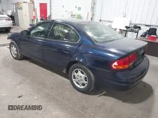 ✅ 2001 Oldsmobile Alero GL2 • VIN: 1G3NL52E91C238545 • Лот: 43744566. Опубликован ранее на IAAI с пробегом 262 915 миль. Бесплатный доступ к архиву аукционных продаж из США и подробный отчёт об истории автомобиля на DreamBid. Изображение 3.