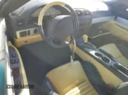 ✅ 2002 Ford Thunderbird Hardtop Premium • VIN: 1FAHP60A72Y107115 • Lot: 77442974. Wystawiony na Copart z przebiegiem Nie podano. Bezpłatny archiwum sprzedaży aukcyjnych z USA i szczegółowy raport historii pojazdu na DreamBid. Zdjęcie 8.