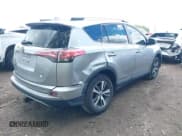 ✅ 2018 Toyota RAV4 XLE • VIN: 2T3WFREV1JW427878 • Lot: 42191031. Listed on IAAI with 97,264 mi. Free auction sales archive from the USA and detailed vehicle history report at DreamBid. Image 4.