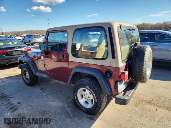 ✅ 2001 Jeep Wrangler Sport • VIN: 1J4FA49S61P325399 • Лот: 92879195. Опубликован ранее на Copart с пробегом 195 636 миль. Бесплатный доступ к архиву аукционных продаж из США и подробный отчёт об истории автомобиля на DreamBid. Изображение 2.