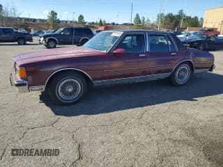 ✅ 1986 Chevrolet Caprice • VIN: 1G1BN69H0GX204734 • Лот: 47292705. Опубликован ранее на Copart с пробегом 24 345 миль. Бесплатный доступ к архиву аукционных продаж из США и подробный отчёт об истории автомобиля на DreamBid. Изображение 1.