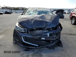 ✅ 2018 Chevrolet Cruze LS • VIN: 1G1BC5SM5J7171101 • Lot: 40264313. Listed on Copart with 32,868 mi. Free auction sales archive from the USA and detailed vehicle history report at DreamBid. Image 5.