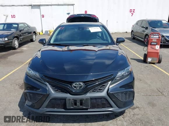 2022 Toyota Camry SE with VIN 4T1G11BK1NU050000, listed as a IAAI auction lot 42348766 with 57,429 mi miles and . Bid and sale history available at DreamBid. Image 12.