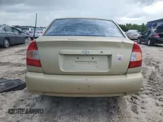 2002 Hyundai Accent GL z VIN KMHCG45C02U296132, wystawiony jako Copart lot #59401835 z przebiegiem 115 421 mil mil oraz Czysty tytuł • Clean title. Historia ofert i sprzedaży dostępna na DreamBid. Obrazek 6.