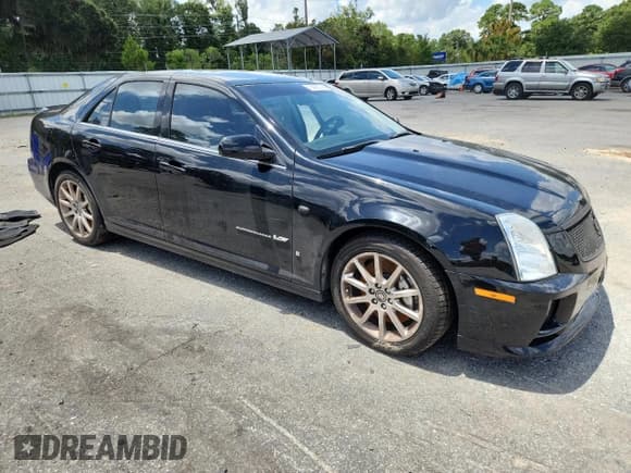 ✅ 2006 Cadillac STS-V • VIN: 1G6DX67D460215899 • Lot: 65453005. Wystawiony na Copart z przebiegiem 140 509 mil. Bezpłatny archiwum sprzedaży aukcyjnych z USA i szczegółowy raport historii pojazdu na DreamBid. Zdjęcie 4.