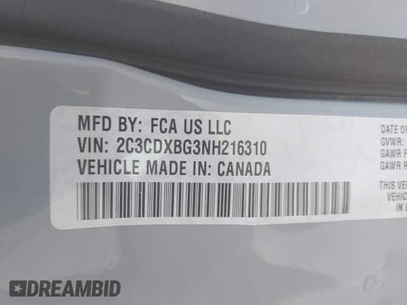 2022 Dodge Charger SXT with VIN 2C3CDXBG3NH216310, listed as a IAAI auction lot 43225885 with 81,885 mi miles and . Bid and sale history available at DreamBid. Image 9.