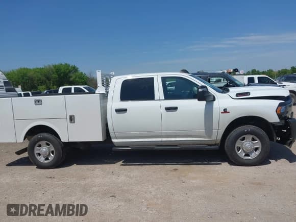 ✅ 2023 Ram 2500 Tradesman • VIN: 3C6UR5HL7PG547413 • Лот: 41998600. Опубликован ранее на IAAI с пробегом 19 803 миль. Бесплатный доступ к архиву аукционных продаж из США и подробный отчёт об истории автомобиля на DreamBid. Изображение 13.