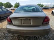 ✅ 2004 Ford Taurus SE • VIN: 1FAFP532X4A192520 • Lot: 54305335. Listed on Copart with Not provided. Free auction sales archive from the USA and detailed vehicle history report at DreamBid. Image 6.