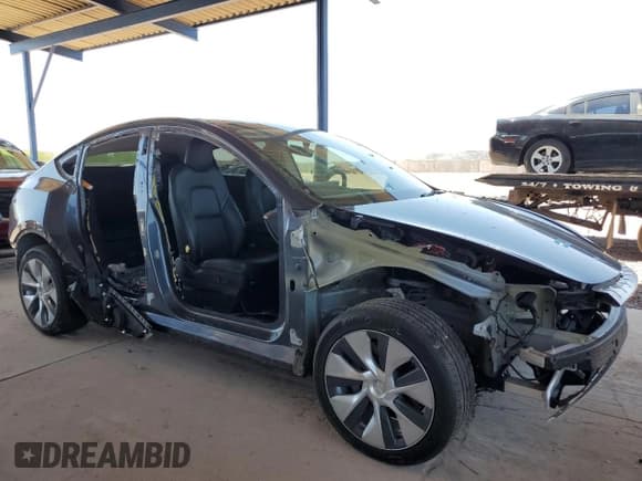 ✅ 2023 Tesla Model Y Long Range • VIN: 7SAYGDEE1PF609185 • Lot: 52174015. Wystawiony na Copart z przebiegiem 39 696 mil. Bezpłatny archiwum sprzedaży aukcyjnych z USA i szczegółowy raport historii pojazdu na DreamBid. Zdjęcie 4.