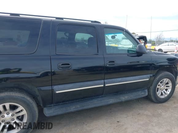 ✅ 2003 Chevrolet Suburban LS • VIN: 3GNEC16T03G334122 • Lot: 41860521. Wystawiony na IAAI z przebiegiem 195 648 mil. Bezpłatny archiwum sprzedaży aukcyjnych z USA i szczegółowy raport historii pojazdu na DreamBid. Zdjęcie 13.