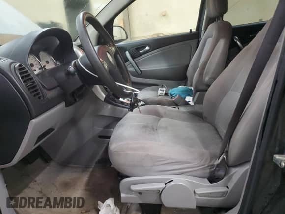 2006 Saturn VUE z VIN 5GZCZ33D66S801871, wystawiony jako Copart lot #84717244 z przebiegiem 163 637 mil mil oraz Czysty tytuł • Clean title. Historia ofert i sprzedaży dostępna na DreamBid. Obrazek 7.