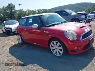 2010 MINI Hardtop S with VIN WMWMF7C52ATZ70834, listed as a IAAI auction lot 42950352 with 88,989 mi miles and . Bid and sale history available at DreamBid. Image 1.