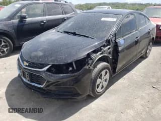 ✅ 2018 Chevrolet Cruze LS • VIN: 1G1BC5SM0J7148454 • Lot: 50371633. Listed on Copart with 112,015 mi. Free auction sales archive from the USA and detailed vehicle history report at DreamBid. Image 1.