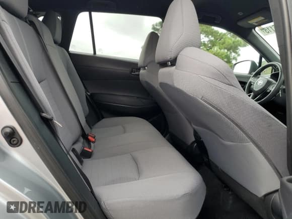 ✅ 2023 Toyota Corolla Cross Hybrid S • VIN: 7MUFBABG9PV009474 • Lot: 69666115. Wystawiony na Copart z przebiegiem 12 804 mil. Bezpłatny archiwum sprzedaży aukcyjnych z USA i szczegółowy raport historii pojazdu na DreamBid. Zdjęcie 11.