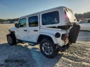 ✅ 2020 Jeep Wrangler Unlimited Sahara • VIN: 1C4HJXEN8LW247541 • Lot: 84644725. Listed on Copart with 128,984 mi. Free auction sales archive from the USA and detailed vehicle history report at DreamBid. Image 2.