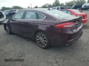 ✅ 2017 Ford Fusion Titanium • VIN: 3FA6P0D91HR175695 • Лот: 84728215. Опубликован ранее на Copart с пробегом 69 572 миль. Бесплатный доступ к архиву аукционных продаж из США и подробный отчёт об истории автомобиля на DreamBid. Изображение 2.