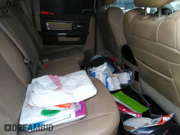 2017 Ram 1500 Laramie z VIN 1C6RR6NT0HS585415, wystawiony jako IAAI lot #40769269 z przebiegiem 133 057 mil mil oraz . Historia ofert i sprzedaży dostępna na DreamBid. Obrazek 8.