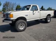 ✅ 1990 Ford F-250 • VIN: 1FTHF25G0LPA81032 • Lot: 54219895. Listed on Copart with 63,795 mi. Free auction sales archive from the USA and detailed vehicle history report at DreamBid. Image 1.
