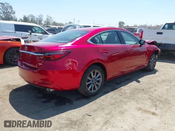 ✅ 2020 Mazda 6 Sport • VIN: JM1GL1UM6L1519982 • Lot: 42934032. Listed on IAAI with 78,679 mi. Free auction sales archive from the USA and detailed vehicle history report at DreamBid. Image 4.