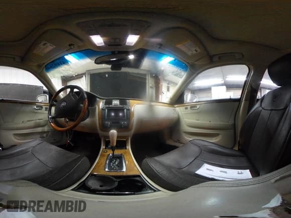 ✅ 2009 Cadillac DTS 1SA • VIN: 1G6KD57Y59U119533 • Lot: 41892648. Listed on IAAI with 177,685 mi. Free auction sales archive from the USA and detailed vehicle history report at DreamBid. Image 18.