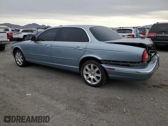 ✅ 2005 Jaguar XJ 8 LWB • VIN: SAJWA79CX5SG35319 • Лот: 49321465. Опубликован ранее на Copart с пробегом 182 834 миль. Бесплатный доступ к архиву аукционных продаж из США и подробный отчёт об истории автомобиля на DreamBid. Изображение 2.