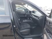 ✅ 2021 Mazda CX-5 Sport • VIN: JM3KFABM6M0366989 • Lot: 43698716. Listed on IAAI with 61,377 mi. Free auction sales archive from the USA and detailed vehicle history report at DreamBid. Image 5.