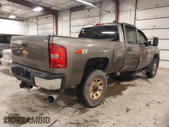 ✅ 2014 Chevrolet Silverado 2500HD LT • VIN: 1GC1KXC85EF131664 • Lot: 40820826. Listed on IAAI with 113,817 mi. Free auction sales archive from the USA and detailed vehicle history report at DreamBid. Image 4.